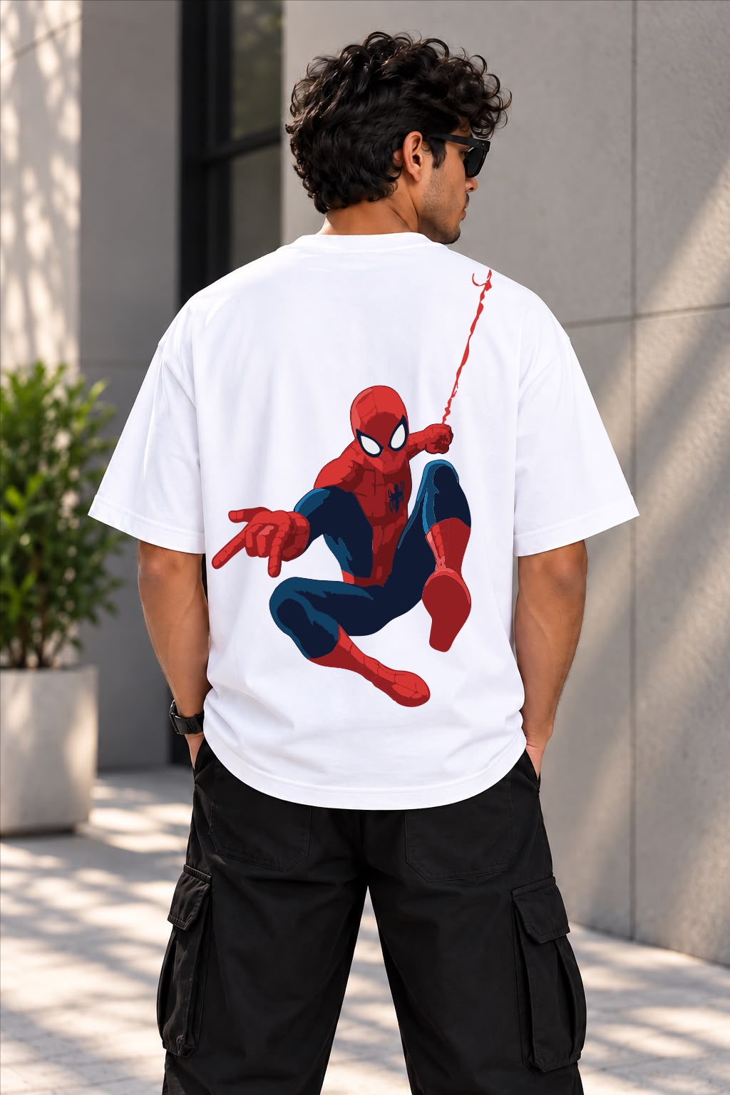 Front view of TIM Clothing white oversized T-shirt with red spider web graphic